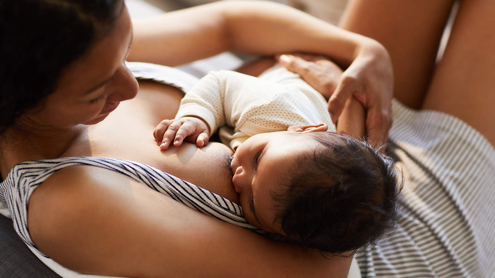 A breastfeeding mother - Breastfeeding Support
